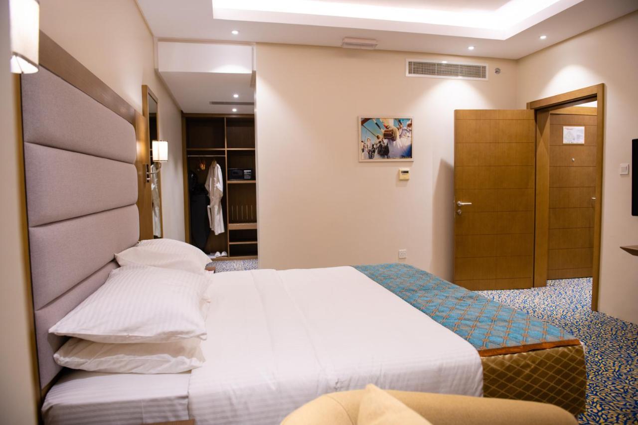 Rozana Hotel Muskat Bagian luar foto
