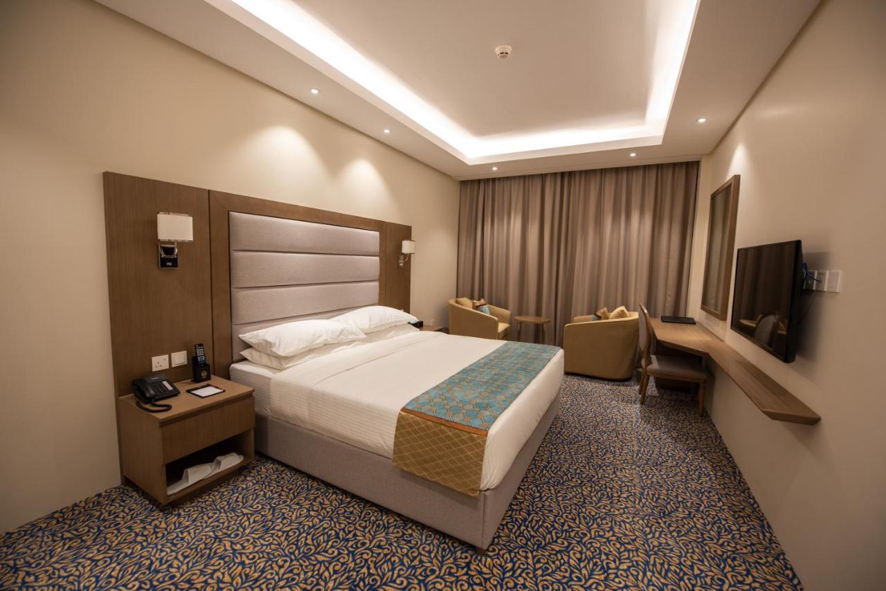 Rozana Hotel Muskat Bagian luar foto