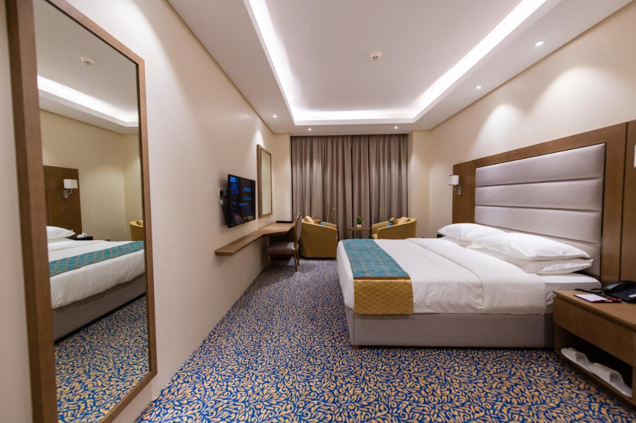 Rozana Hotel Muskat Bagian luar foto