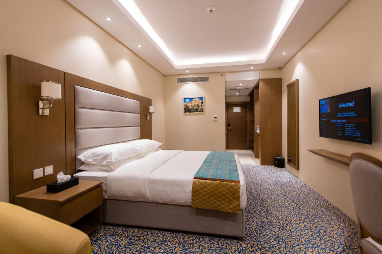 Rozana Hotel Muskat Bagian luar foto