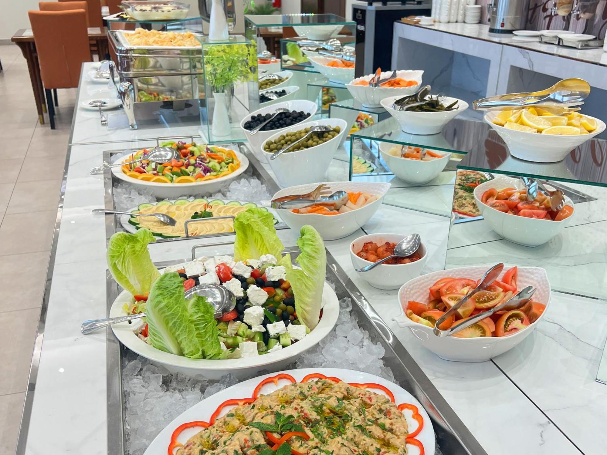 Rozana Hotel Muskat Bagian luar foto